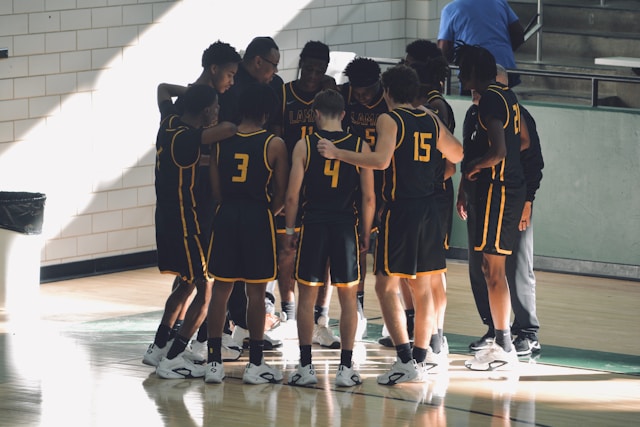Basketball team being coached